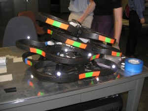 several quadcopters stacked up in a pile