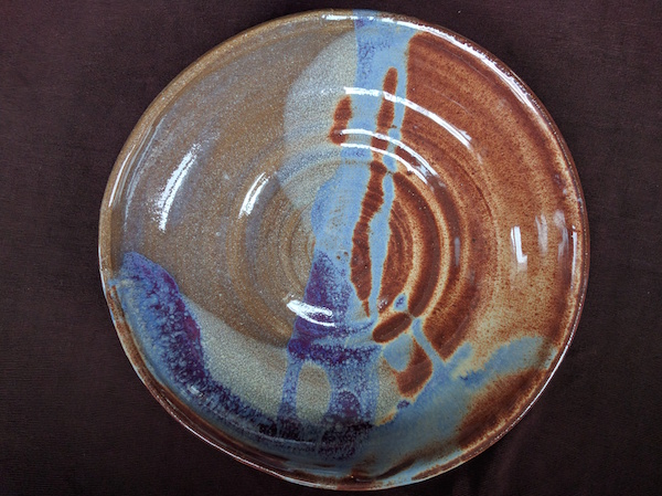 top down view of a bowl, brown and purple