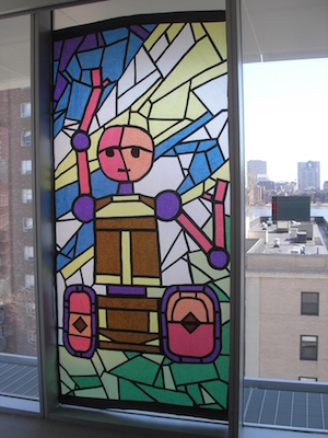 colorful stained glass style robot in a window