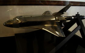 model space shuttle shiny silver model of a space shuttle